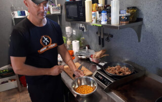 06-millennium-tandem-team-breakfast-chief-instructor Millennium Tandem Team breakfast prepared by the chief instructor at the drop zone